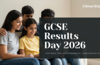 Mother and three children celebrating GCSE results day together at home, looking at results on a laptop